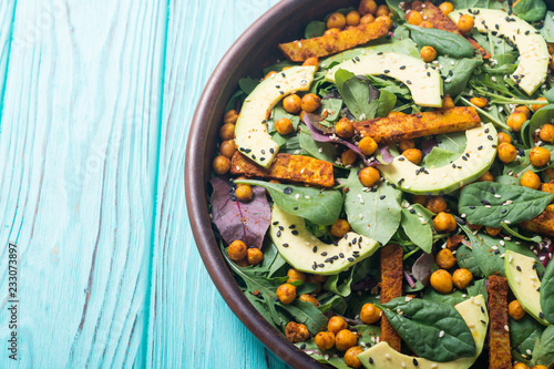 Baby spinach salad with sweet potato , chickpeas and avocado