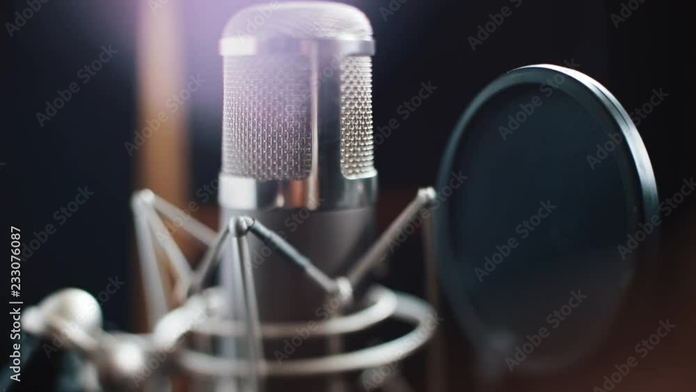 in recording studio microphone entertainment media music professional radio sound recording rock singing stage sound actor technology voice communication equipment dark musical