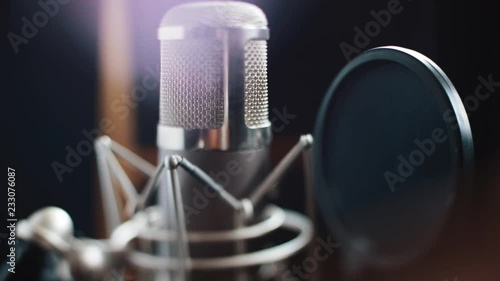 in recording studio microphone entertainment media music professional radio sound recording rock singing stage sound actor technology voice communication equipment dark musical