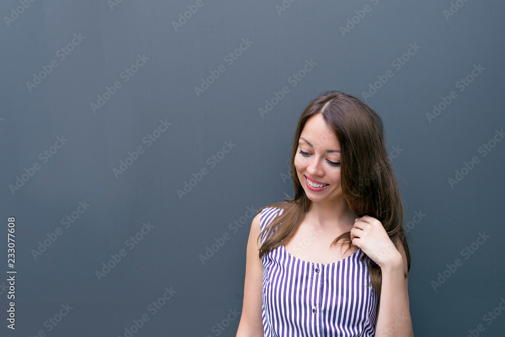 Good-looking young woman with magnetic smile Good-looking young woman with magnetic smile