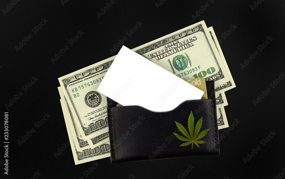  marijuana and money background. bush cannabis and card.