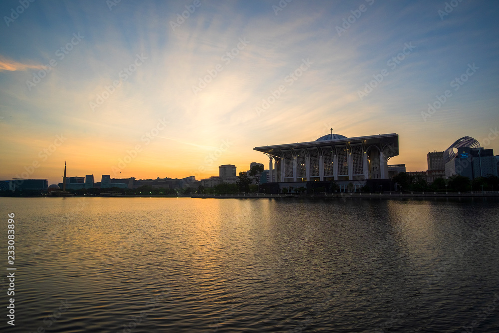 sunrise scenery at public mosque,putrajaya,malaysia. soft focus,blur due to long exposure. visible noise due to high ISO.