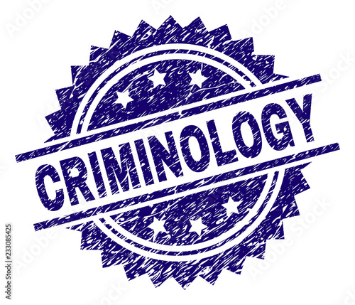 CRIMINOLOGY stamp seal watermark with distress style. Blue vector rubber print of CRIMINOLOGY text with retro texture.