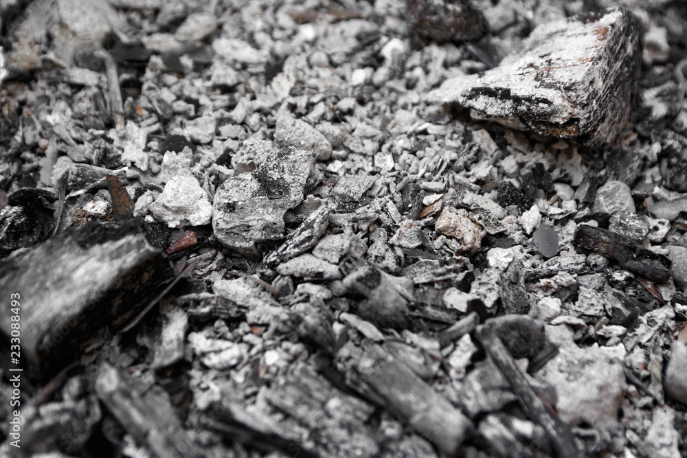 Gray ash from the oven background texture, cinder, grey ashes from the wood from the fireplace Gray ash from the oven background texture, cinder, grey ashes from the wood from the fireplace