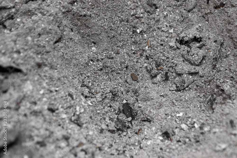 Gray ash from the oven background texture, cinder, grey ashes from the wood from the fireplace Gray ash from the oven background texture, cinder, grey ashes from the wood from the fireplace