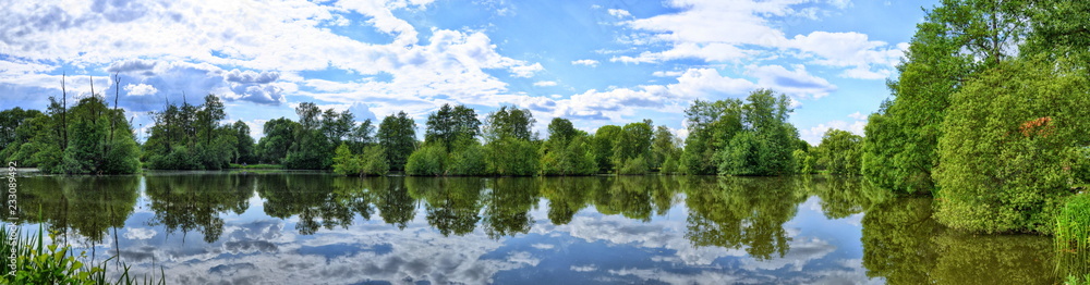 Fulda river in Aueweiher Park  in Fulda, Hessen, Germany (panora