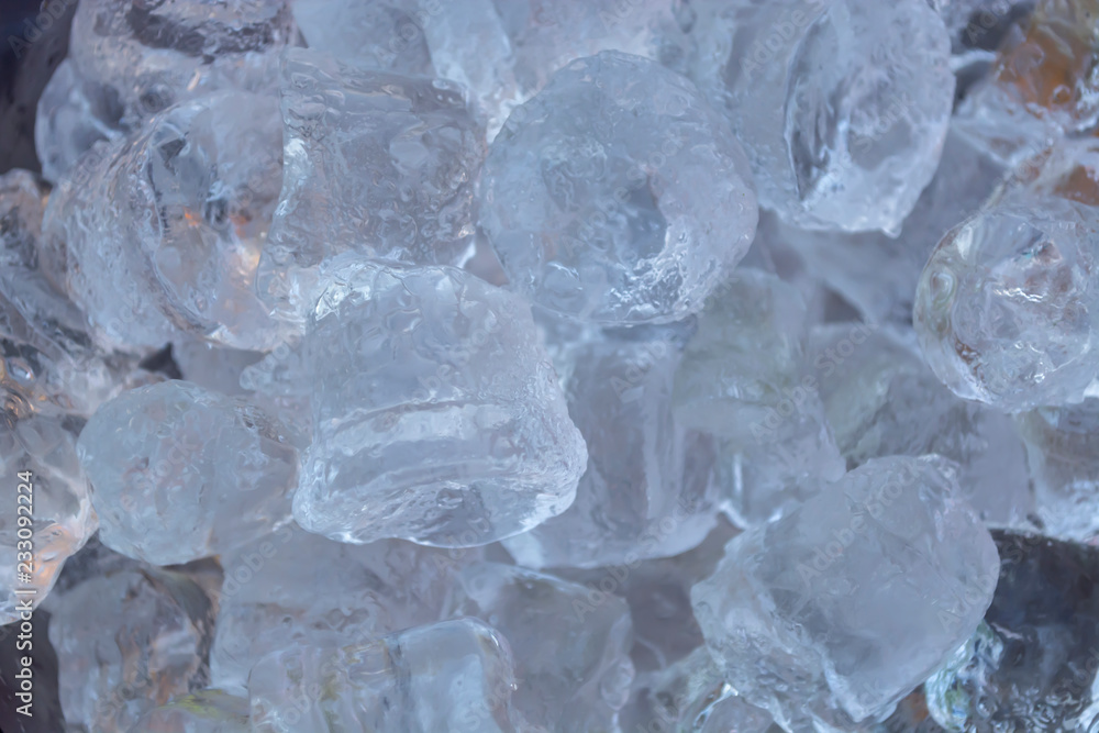 Detailed ,close up view of ice cubes to defrost, effect of shadows, sunlight