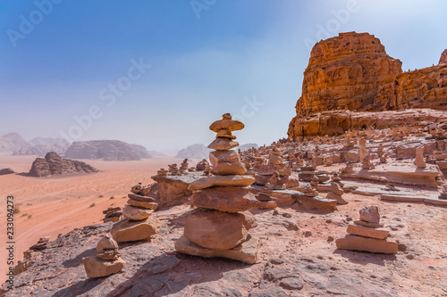 Red mountains of Wadi Rum desert in Jordan. Wadi Rum also known as The Valley of the Moon is a valley cut into the sandstone and granite rock in southern Jordan to the east of Aqaba