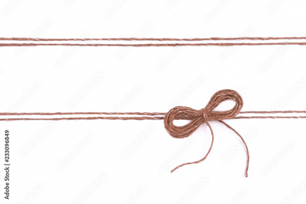 Burlap twine string bow isolated on white background
