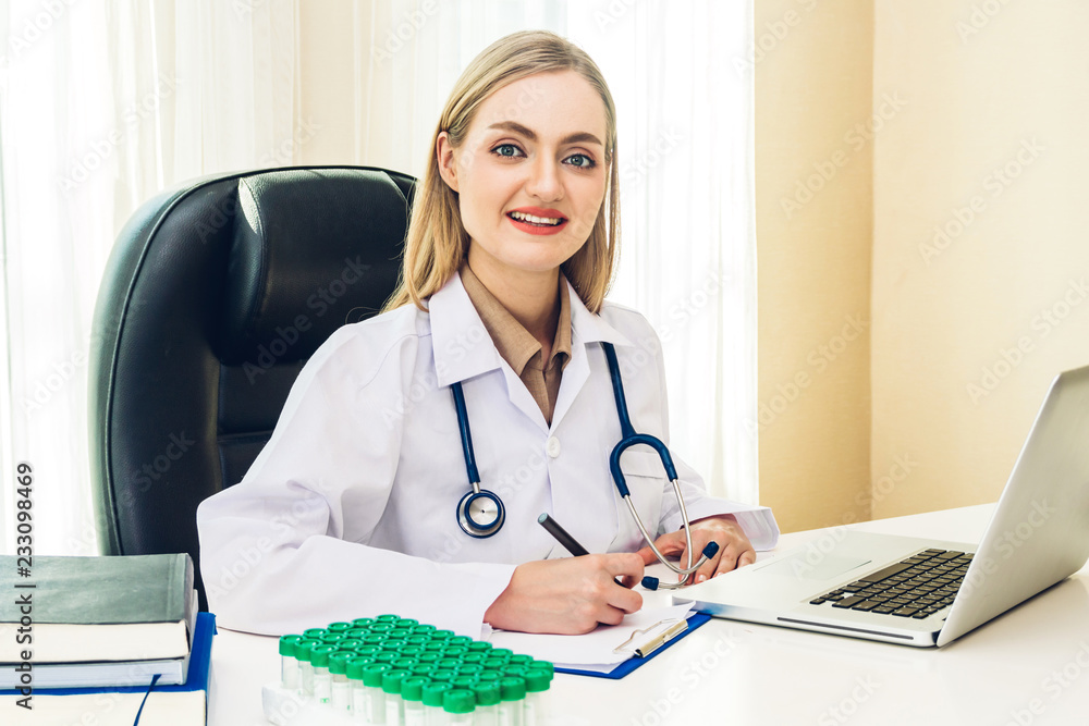 Doctor and stethoscope working with laptop computer in hospital.healthcare and medicine Doctor and stethoscope working with laptop computer in hospital.healthcare and medicine