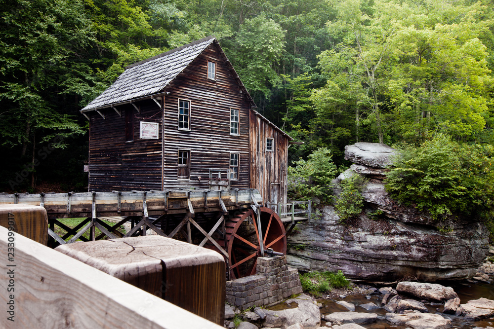 Glade Creek Grist Mill at Babcock State Park, West Virginia with stream and rocks Glade Creek Grist Mill at Babcock State Park, West Virginia with stream and rocks