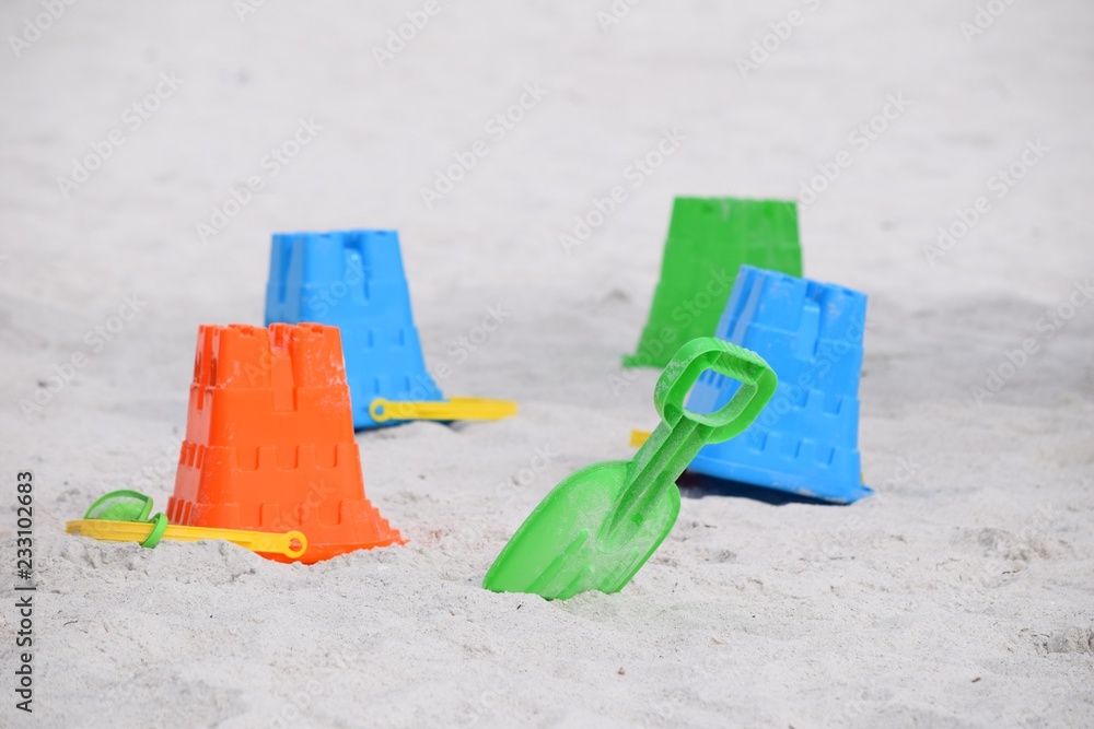 plastic toys on the beach buckets and shovel to make sand castles plastic toys on the beach buckets and shovel to make sand castles