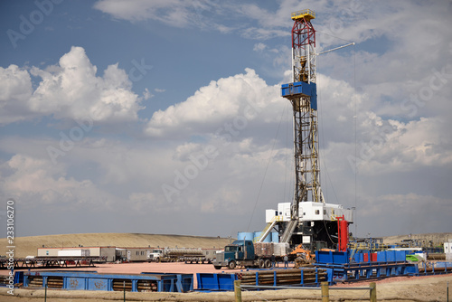 Land-based oil and gas exploration, drilling rig and well site in the energy-rich Powder River Basin. photo