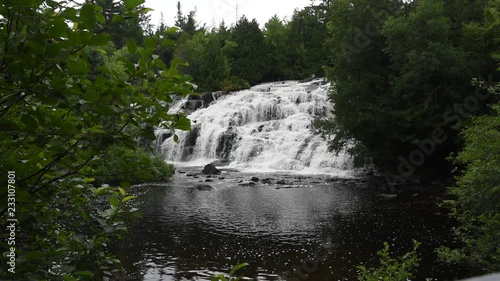 A beautiful waterfall flows on a summer day in Upper Michigan