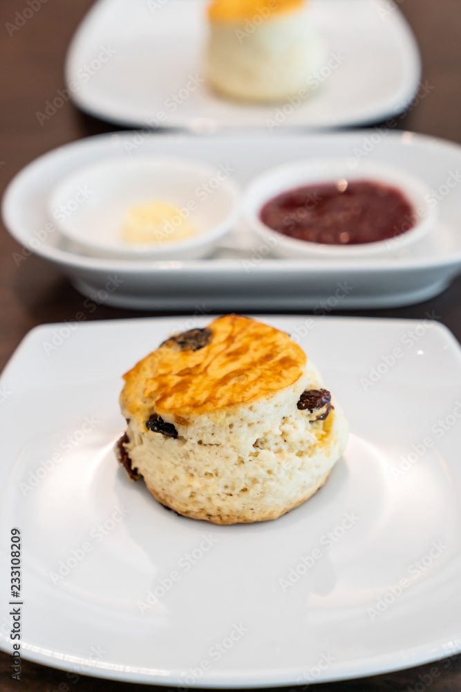 scone with butter and jam scone with butter and jam
