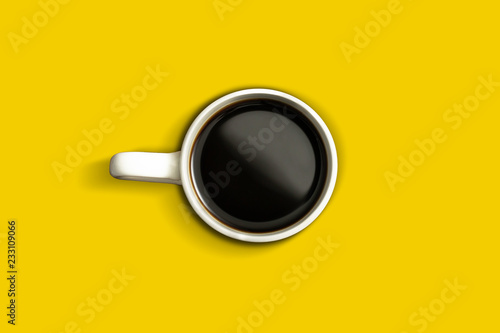 Trendy Cup of Coffee Isolated top view on a Yellow Background, Back drop