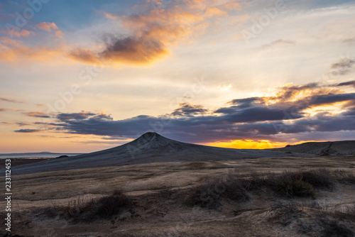 Mud volcanoes at sunset, beautiful amazing sky © Vastram