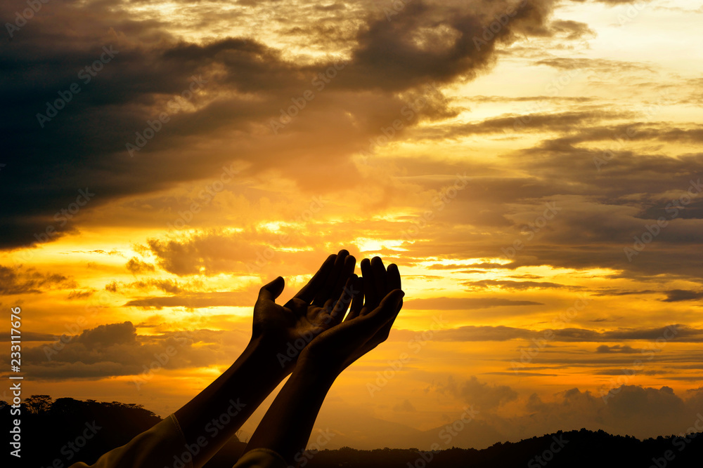 Fototapeta premium Male hands with open palm praying to god