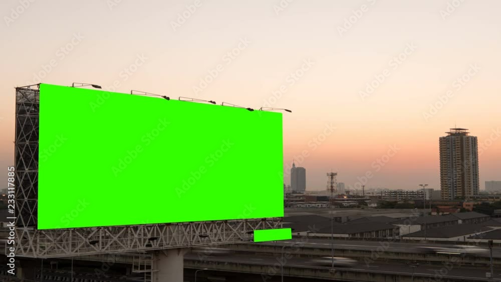 Green screen of advertising billboard on expressway during the sunset with city background in Bangkok, Thailand. Time lapse... Green screen of advertising billboard on expressway during the sunset with city background in Bangkok, Thailand. Time lapse...