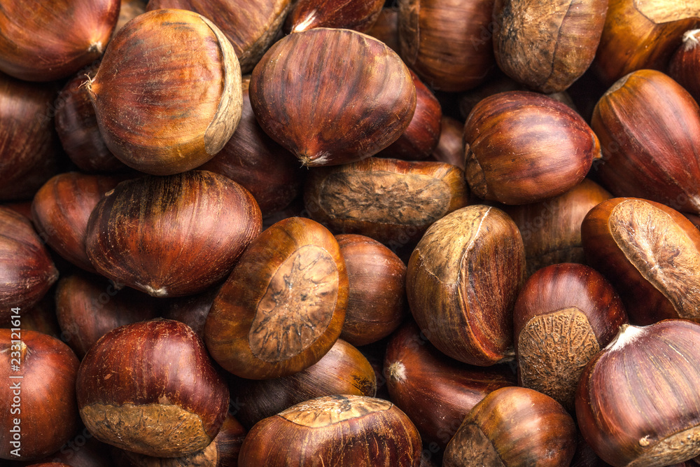 Roasted chestnuts served on an old table Roasted chestnuts served on an old table