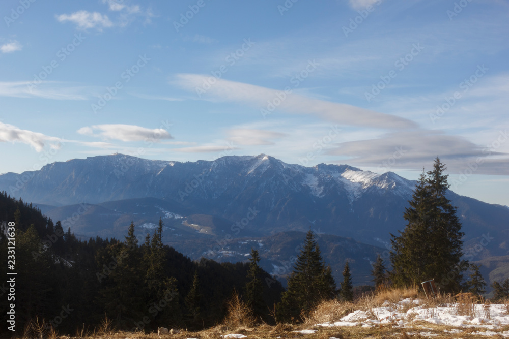 mountain slopes in the Carpathians, a famous ski resort in Romania, with ski lifts to the top of the slope