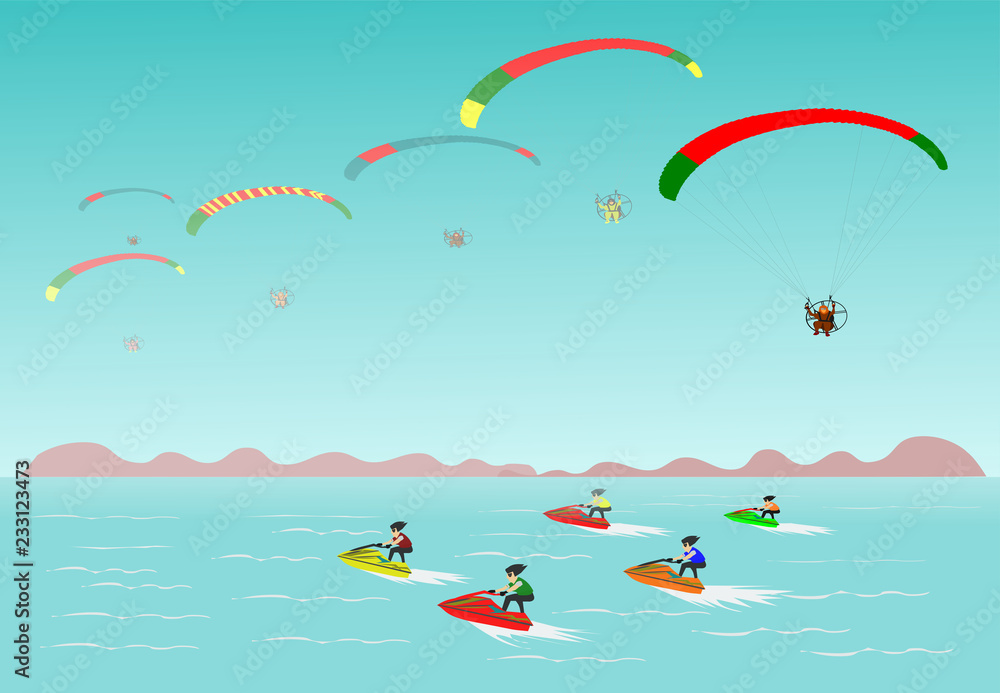 Seaside vacation in the sky gliders. There is a jet ski in the sea blue sky background Seaside vacation in the sky gliders. There is a jet ski in the sea blue sky background