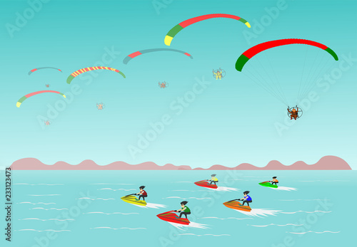 Seaside vacation in the sky gliders. There is a jet ski in the sea blue sky background