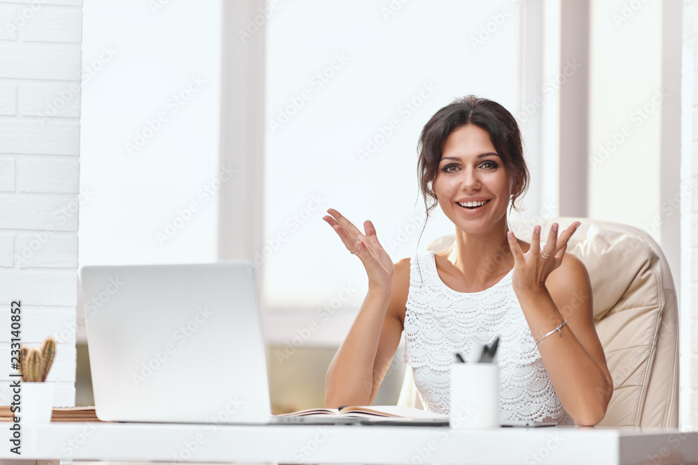 Young brunette business woman in a modern office Young brunette business woman in a modern office