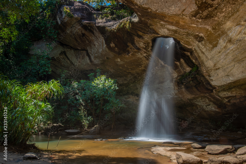 Naklejka premium Sang Chan Waterfall (Moonlight Waterfall) at Pha Taem National Park ,Ubon Ratchathani province,Thailand