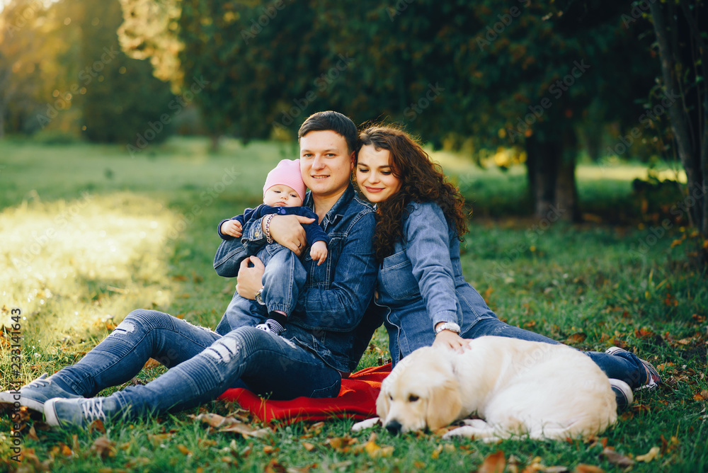 Fototapeta premium Beautiful family in a park