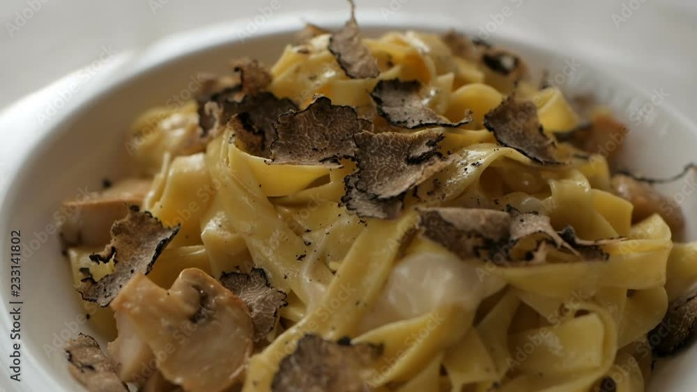 Pasta with truffles, typical autumn dish in Italian restaurant Pasta with truffles, typical autumn dish in Italian restaurant