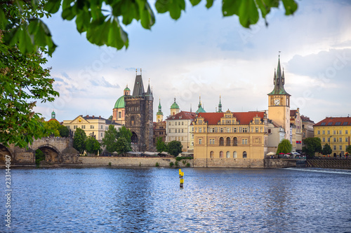 Evening view of Charles Bridge and Lesser Bridge Tower in Prague, Czech Republic