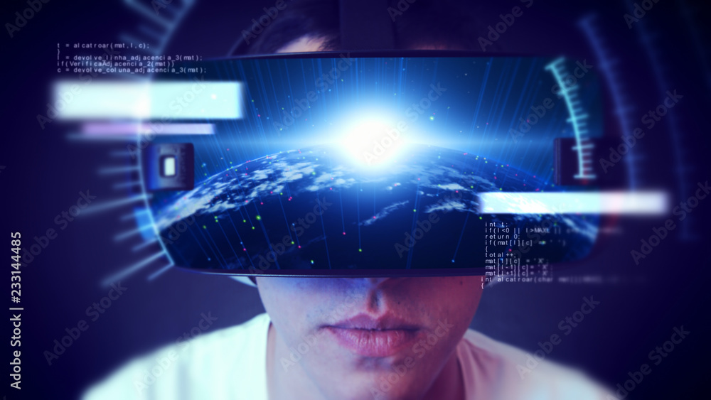 Young man wearing VR headset and experiencing virtual reality. Technology related digital earth network concept. Young man wearing VR headset and experiencing virtual reality. Technology related digital earth network concept.