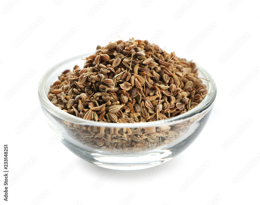 Glass bowl with caraway on white background Glass bowl with caraway on white background