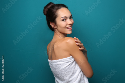 Beautiful young woman wrapp...