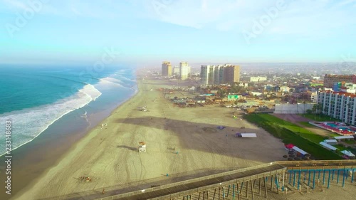 Rosarito Beach Hotel Aerial View from helicopter and drone including beach and ocean views pool and amenities of the hotel sun rise morning blue sky  photo