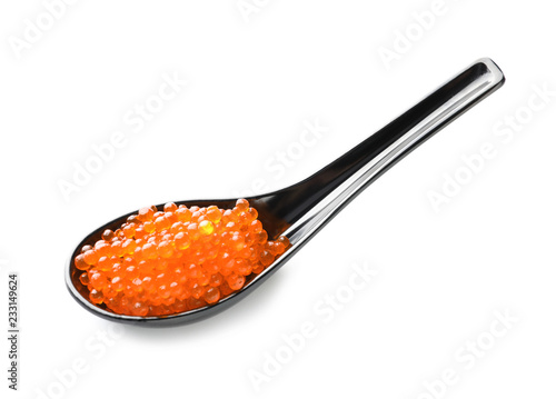 Spoon with delicious red caviar on white background