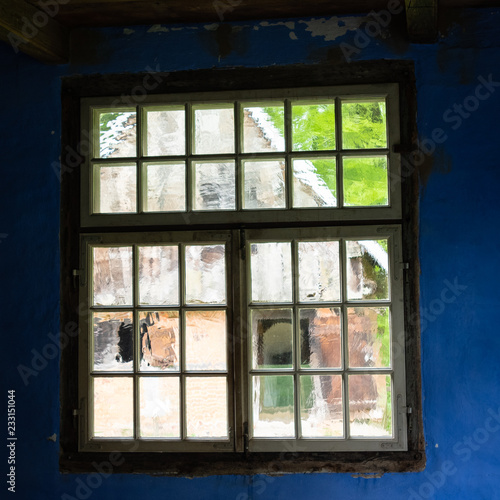 The window of an old farmhouse  inside