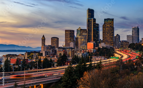 Seattle downtown skyline sunset from Dr. Jose Rizal or 12th Avenue South Bridge with traffic trail lights