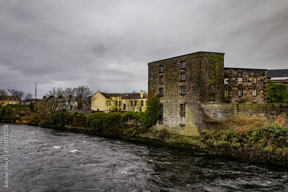 old stone house along the river