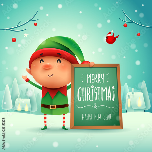 Merry Christmas! Little elf with message board in Christmas snow scene winter landscape.