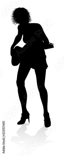 A woman guitarist musician ...