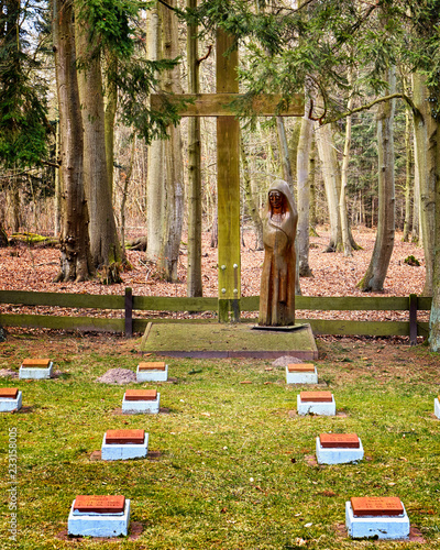 Graveyard with war graves of fallen soldiers at a cross in Gelbensande. Germany photo