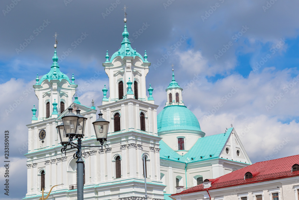 Obraz premium Azure and red roofs of the city, Cathedral of St. Francis Xavier in Grodno, Belarus