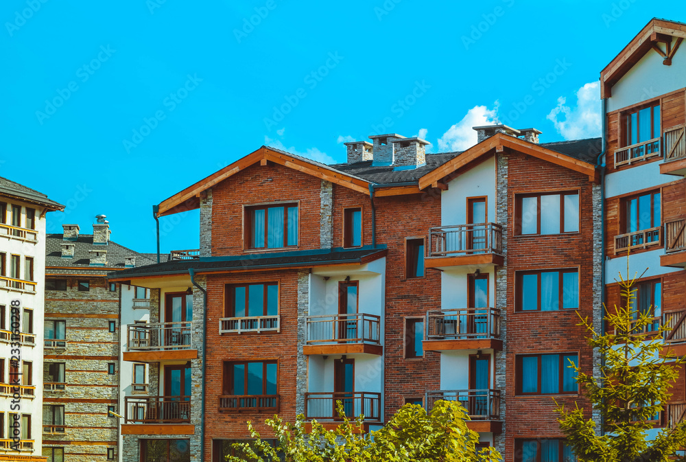Apartments in Balkans Mountains, Europe, Bulgaria. Luxury houses at the Pirin Golf village, summertime.