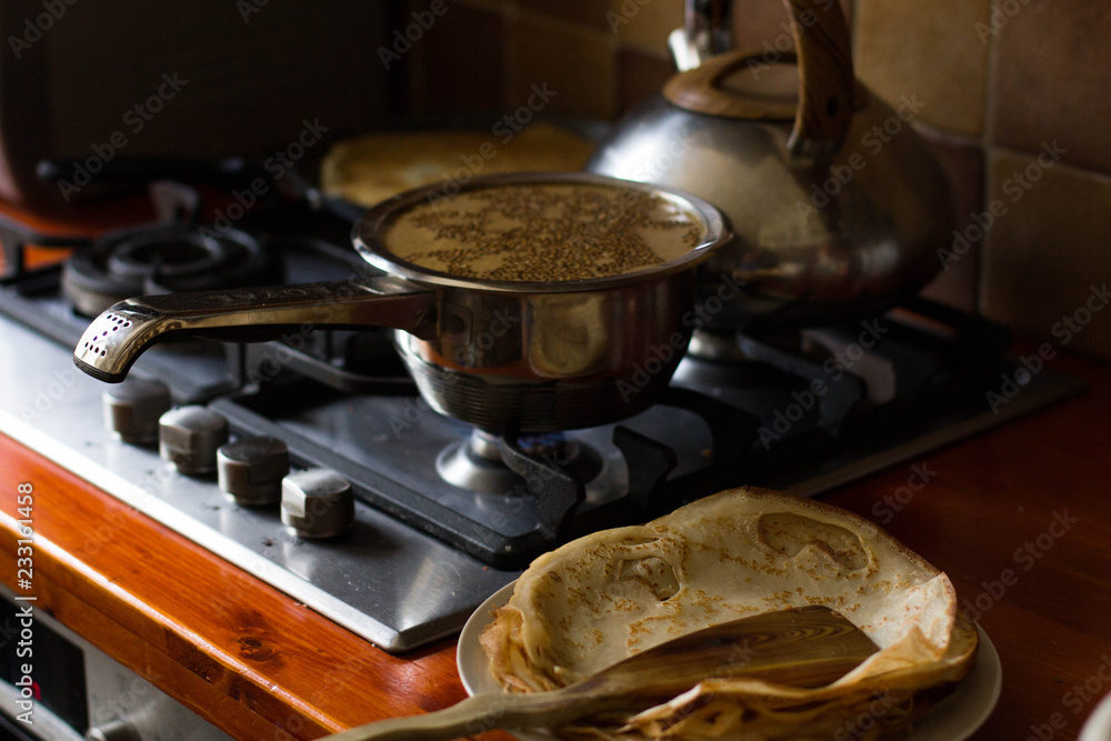 Pancake baked in a frying pan, close-up