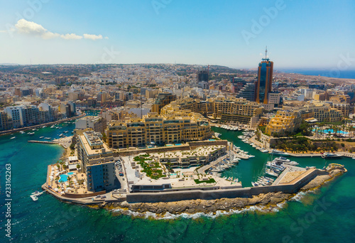 Arial view of St. Julian's city and Portomaso marina. Malta island. Sunny summer day. photo