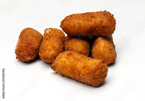 Croquettes surrounded by white background photo