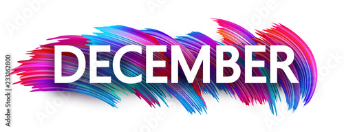 December sign or banner with colorful brush stroke design on white.