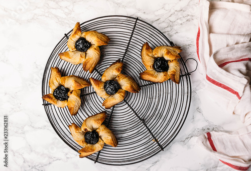 Scandinavian pastry Joulutorttu is traditional finnish and Swedish christmas pastry. It is traditionally made from puff pastry in the shape of a star or pinwheel and filled with prune jam and often du